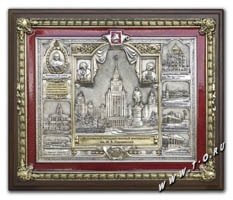 Изготовление барельефа с элементами гравюры "Декоративное панно-коллаж к юбилею МГУ имени М.В.Ломоносова" из меди с покрытием золотом, серебром, эмалями на плакетке из дерева. Изготовление барельефов со старинных гравюр и по фотографиям на заказ в Москве.